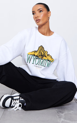 PRETTY LITTLE THING White Wyoming Graphic Printed Washed Sweatshirt