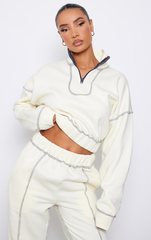 PRETTY LITTLE THING Cream Contrast Stitch Half Zip Cropped Sweat